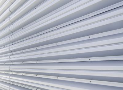 Metal siding being fitted